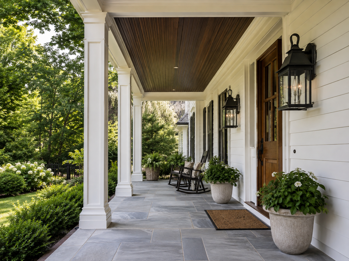 Welcoming covered front porch with detailed trim